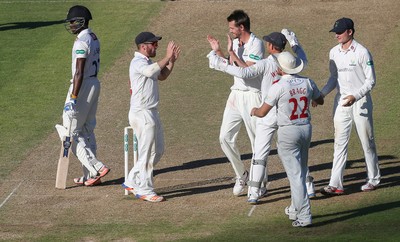 260816 - Glamorgan v Sussex, Specsavers County Championship, Division 2 - Michael Hogan of Glamorgan celebrates after Jofra Archer of Sussex is caught by Mark Wallace of Glamorgan