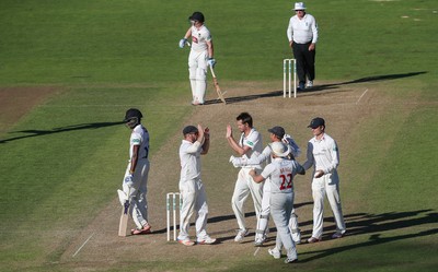 260816 - Glamorgan v Sussex, Specsavers County Championship, Division 2 - Michael Hogan of Glamorgan celebrates after Jofra Archer of Sussex is caught by Mark Wallace of Glamorgan