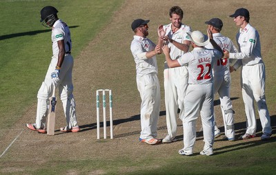 260816 - Glamorgan v Sussex, Specsavers County Championship, Division 2 - Michael Hogan of Glamorgan celebrates after Jofra Archer of Sussex is caught by Mark Wallace of Glamorgan