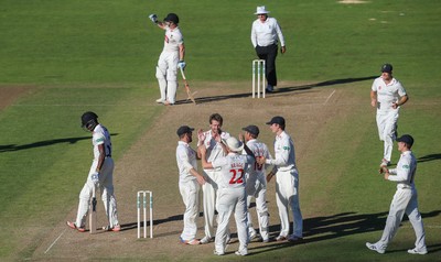 260816 - Glamorgan v Sussex, Specsavers County Championship, Division 2 - Michael Hogan of Glamorgan celebrates after Jofra Archer of Sussex is caught by Mark Wallace of Glamorgan