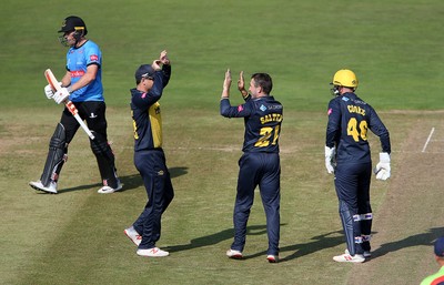 260819 - Glamorgan v Sussex Sharks - Vitality T20 Blast - Andrew Salter of Glamorgan celebrates with team mates  after Phil Salt of Sussex is bowled out