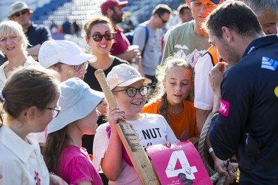 260819 - Glamorgan v Sussex Sharks - Vitality T20 Blast - Players sign autographs after the match