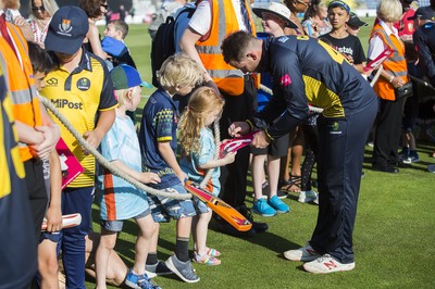 260819 - Glamorgan v Sussex Sharks - Vitality T20 Blast - Players sign autographs after the match