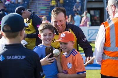 260819 - Glamorgan v Sussex Sharks - Vitality T20 Blast - Players sign autographs after the match