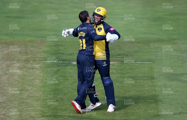 260819 - Glamorgan v Sussex Sharks - Vitality T20 Blast - Andrew Salter and Chris Cooke of Glamorgan celebrate after Alex Carey of Sussex is caught out