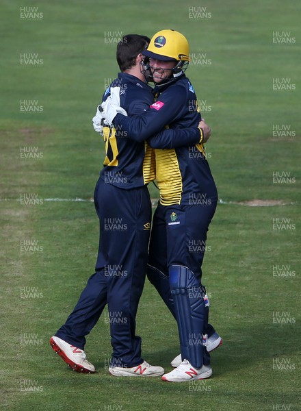 260819 - Glamorgan v Sussex Sharks - Vitality T20 Blast - Andrew Salter and Chris Cooke of Glamorgan celebrate after Alex Carey of Sussex is caught out