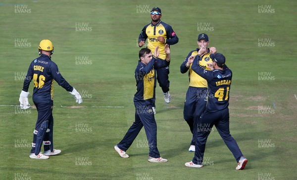 260819 - Glamorgan v Sussex Sharks - Vitality T20 Blast - Andrew Salter of Glamorgan celebrates with team mates after bowling out Delray Rawlins of Sussex