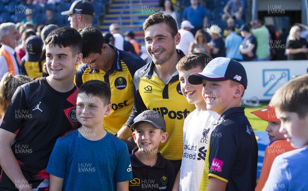260819 - Glamorgan v Sussex Sharks - Vitality T20 Blast - Players sign autographs after the match