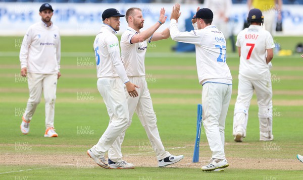 270623 - Glamorgan v Sussex, LV= Insurance County Championship, Div 2 - Nathan McAndrew of Sussex celebrates bowling out Billy Root of Glamorgan