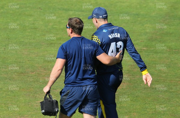 080718 - Glamorgan v Sussex Sharks, Vitality Blast 2018 - Shaun Marsh of Glamorgan leaves the field after injuring himself while fielding