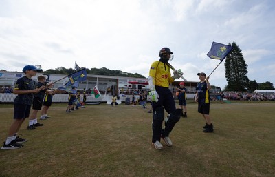 220726 - Glamorgan v Sussex Sharks, Metro Bank One Day Cup - Eddie Byrom of Glamorgan, along with Callum Nicholls of Glamorgan head out for the start of play
