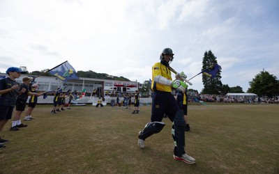 220726 - Glamorgan v Sussex Sharks, Metro Bank One Day Cup - Eddie Byrom of Glamorgan, along with Callum Nicholls of Glamorgan head out for the start of play