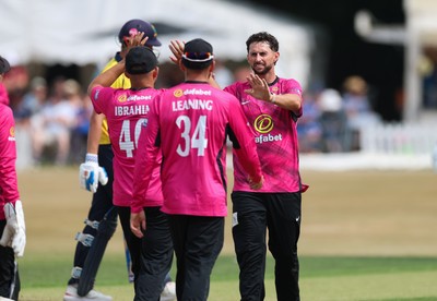 220726 - Glamorgan v Sussex Sharks, Metro Bank One Day Cup - Fynn Hudson-Prentice of Sussex celebrates as he dismisses Will Smale of Glamorgan