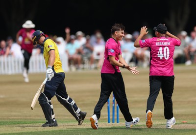 220726 - Glamorgan v Sussex Sharks, Metro Bank One Day Cup - Toby Munt of Sussex celebrates as he dismisses Henry Hurle of Glamorgan
