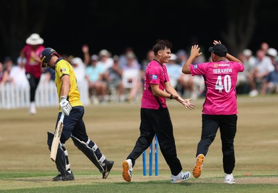 220726 - Glamorgan v Sussex Sharks, Metro Bank One Day Cup - Toby Munt of Sussex celebrates as he dismisses Henry Hurle of Glamorgan