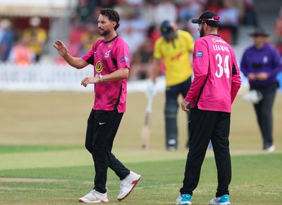 220726 - Glamorgan v Sussex Sharks, Metro Bank One Day Cup - Fynn Hudson-Prentice of Sussex celebrates as he dismisses Callum Nicholls of Glamorgan