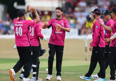 220726 - Glamorgan v Sussex Sharks, Metro Bank One Day Cup - Fynn Hudson-Prentice of Sussex celebrates as he dismisses Callum Nicholls of Glamorgan