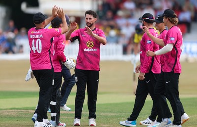 220726 - Glamorgan v Sussex Sharks, Metro Bank One Day Cup - Fynn Hudson-Prentice of Sussex celebrates as he dismisses Callum Nicholls of Glamorgan