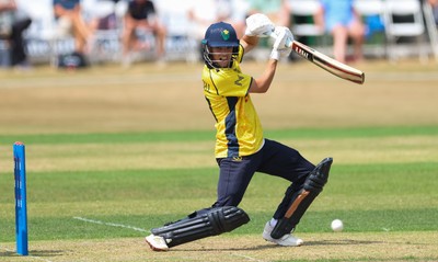 220726 - Glamorgan v Sussex Sharks, Metro Bank One Day Cup - Jack Hope-Bell of Glamorgan plays a shot
