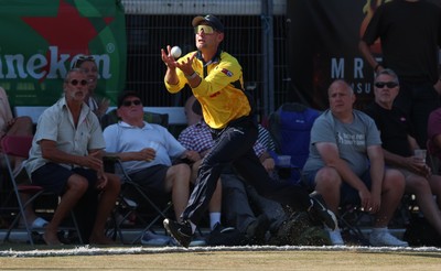 220726 - Glamorgan v Sussex Sharks, Metro Bank One Day Cup - Henry Hurle of Glamorgan looks to take a catch as the crowd looks on