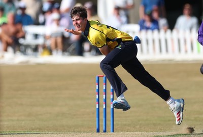 220726 - Glamorgan v Sussex Sharks, Metro Bank One Day Cup - Romano Franco of Glamorgan bowls