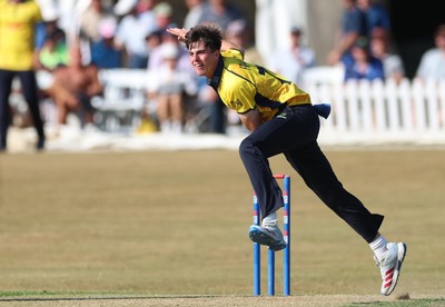 220726 - Glamorgan v Sussex Sharks, Metro Bank One Day Cup - Romano Franco of Glamorgan bowls