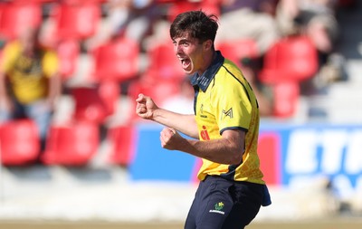 220726 - Glamorgan v Sussex Sharks, Metro Bank One Day Cup - Romano Franco of Glamorgan celebrates after taking the wicket of  Fynn Hudson-Prentice of Sussex