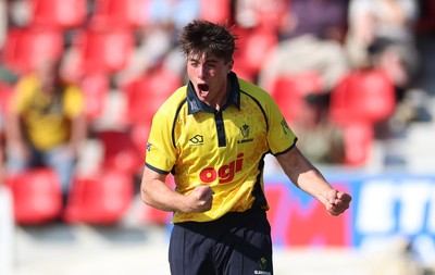 220726 - Glamorgan v Sussex Sharks, Metro Bank One Day Cup - Romano Franco of Glamorgan celebrates after taking the wicket of  Fynn Hudson-Prentice of Sussex