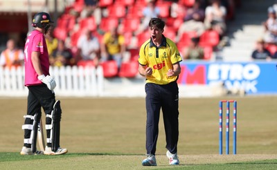 220726 - Glamorgan v Sussex Sharks, Metro Bank One Day Cup - Romano Franco of Glamorgan celebrates after taking the wicket of  Fynn Hudson-Prentice of Sussex