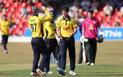 220726 - Glamorgan v Sussex Sharks, Metro Bank One Day Cup - Romano Franco of Glamorgan celebrates after taking the wicket of  Fynn Hudson-Prentice of Sussex