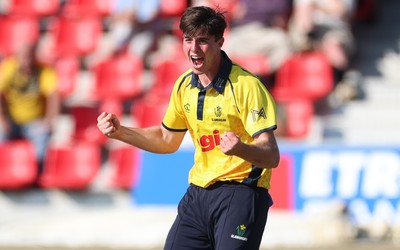 220726 - Glamorgan v Sussex Sharks, Metro Bank One Day Cup - Romano Franco of Glamorgan celebrates after taking the wicket of  Fynn Hudson-Prentice of Sussex