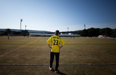220726 - Glamorgan v Sussex Sharks, Metro Bank One Day Cup - Jack Hope-Bell of Glamorgan fields on the boundary in the final overs of the match