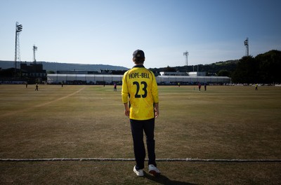 220726 - Glamorgan v Sussex Sharks, Metro Bank One Day Cup - Jack Hope-Bell of Glamorgan fields on the boundary in the final overs of the match