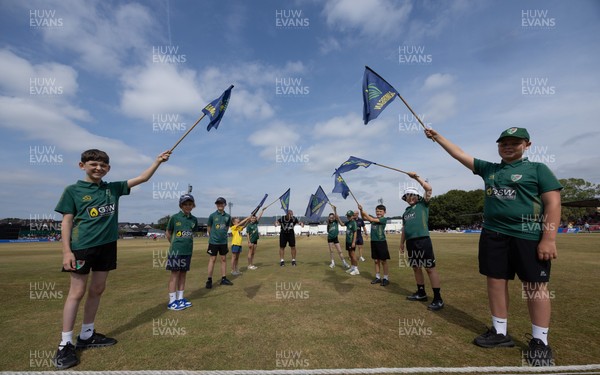 220726 - Glamorgan v Sussex Sharks, Metro Bank One Day Cup - The guard of honour waits to welcome the players