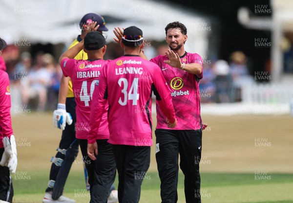 220726 - Glamorgan v Sussex Sharks, Metro Bank One Day Cup - Fynn Hudson-Prentice of Sussex celebrates as he dismisses Will Smale of Glamorgan