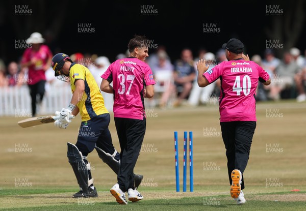 220726 - Glamorgan v Sussex Sharks, Metro Bank One Day Cup - Toby Munt of Sussex celebrates as he dismisses Henry Hurle of Glamorgan