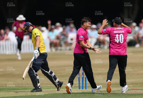 220726 - Glamorgan v Sussex Sharks, Metro Bank One Day Cup - Toby Munt of Sussex celebrates as he dismisses Henry Hurle of Glamorgan