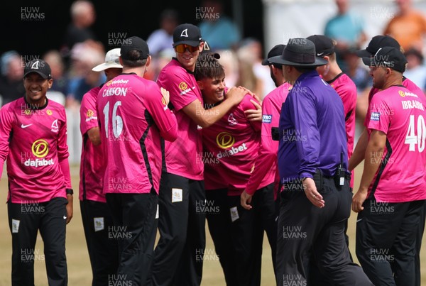 220726 - Glamorgan v Sussex Sharks, Metro Bank One Day Cup - Toby Munt of Sussex celebrates as he dismisses Henry Hurle of Glamorgan