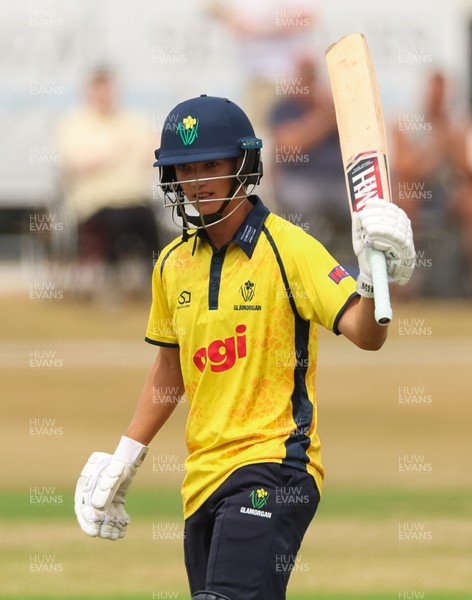 220726 - Glamorgan v Sussex Sharks, Metro Bank One Day Cup - Jack Hope-Bell of Glamorgan raises his bat as he reaches his 50 runs