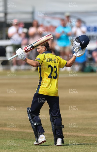 220726 - Glamorgan v Sussex Sharks, Metro Bank One Day Cup - Jack Hope-Bell of Glamorgan celebrates as he reaches his maiden 100 runs