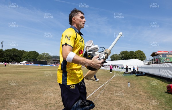 220726 - Glamorgan v Sussex Sharks, Metro Bank One Day Cup - Alex Horton of Glamorgan leaves the pitch after being dismissed on 122