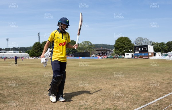 220726 - Glamorgan v Sussex Sharks, Metro Bank One Day Cup - Jack Hope-Bell of Glamorgan leaves the pitch after being dismissed on 123