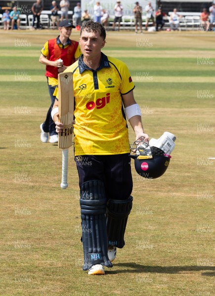 220726 - Glamorgan v Sussex Sharks, Metro Bank One Day Cup - Alex Horton of Glamorgan leaves the pitch after being dismissed on 122