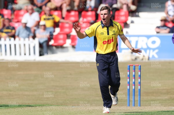 220726 - Glamorgan v Sussex Sharks, Metro Bank One Day Cup - Andy Gorvin of Glamorgan bowls