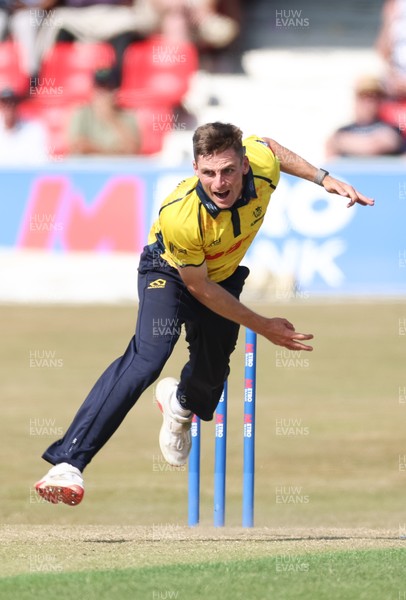 220726 - Glamorgan v Sussex Sharks, Metro Bank One Day Cup - Andy Gorvin of Glamorgan bowls