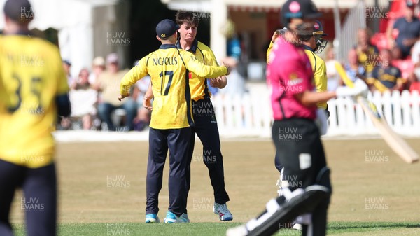 220726 - Glamorgan v Sussex Sharks, Metro Bank One Day Cup - Romano Franco of Glamorgan celebrates after taking the wicket of \s43\
