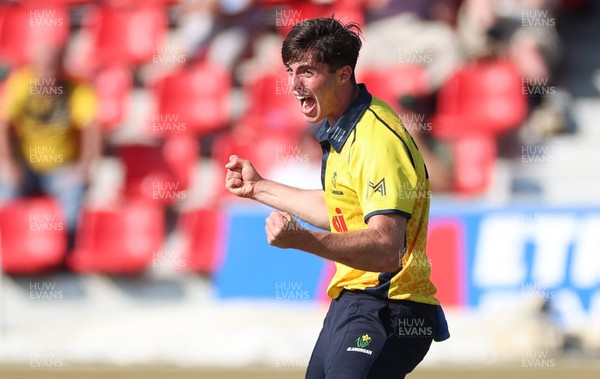220726 - Glamorgan v Sussex Sharks, Metro Bank One Day Cup - Romano Franco of Glamorgan celebrates after taking the wicket of  Fynn Hudson-Prentice of Sussex