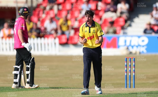 220726 - Glamorgan v Sussex Sharks, Metro Bank One Day Cup - Romano Franco of Glamorgan celebrates after taking the wicket of  Fynn Hudson-Prentice of Sussex