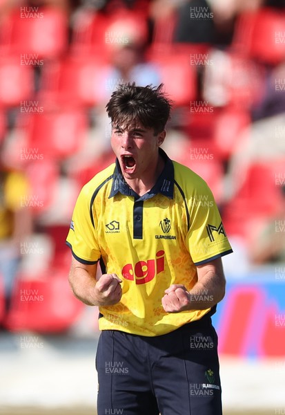 220726 - Glamorgan v Sussex Sharks, Metro Bank One Day Cup - Romano Franco of Glamorgan celebrates after taking the wicket of  Fynn Hudson-Prentice of Sussex
