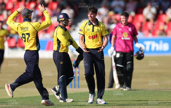 220726 - Glamorgan v Sussex Sharks, Metro Bank One Day Cup - Romano Franco of Glamorgan celebrates after taking the wicket of  Fynn Hudson-Prentice of Sussex